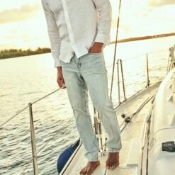 The Ultra-Stretch Driftwood Denim | Light Wash -Fair Harbor Clothing Shop THEDRIFTWOODDENIMPANT LIGHTWASH LIFESTYLE 001 4895315e 84fe 476d a4b6 109fc438789f